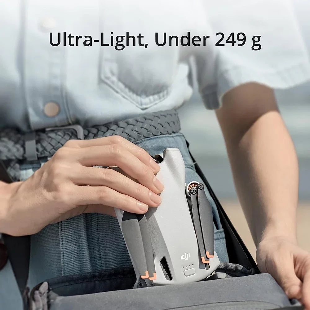 Open Box DJI Mini 3 - Lightweight and Foldable Mini Camera Drone with 4K HDR Video, 38-Min Flight Time, True Vertical Shooting, and Intelligent Features